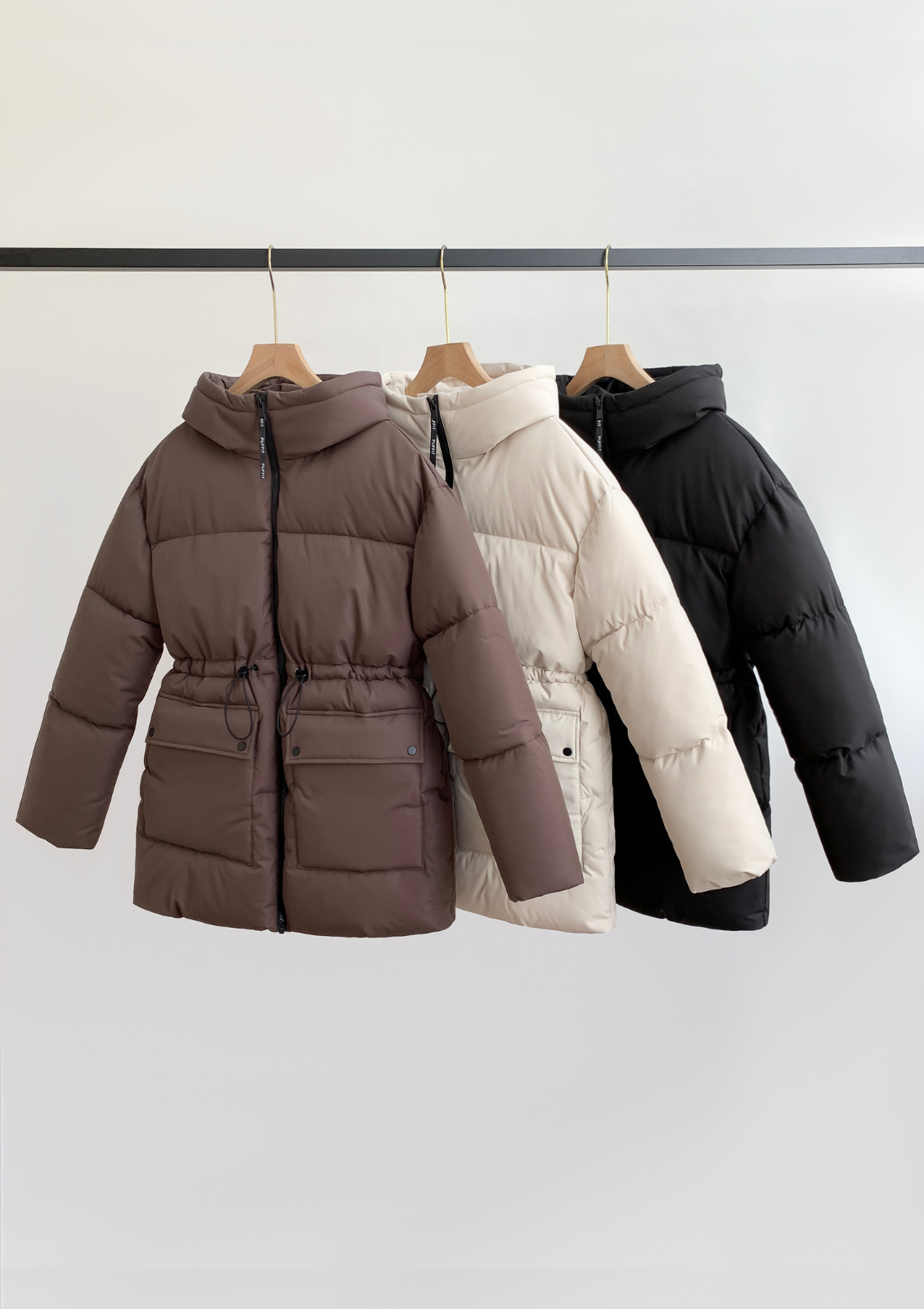 EVA | GIACCA PUFFER CON CAPPUCCIO IMPERMEABILE